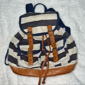 Gently Used Magnetic Snap and Pull Close Striped Backpack